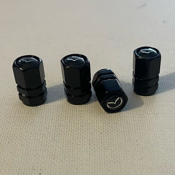 Mazda valve Stem caps in Black set of 4 NWT - Picture 2 of 4